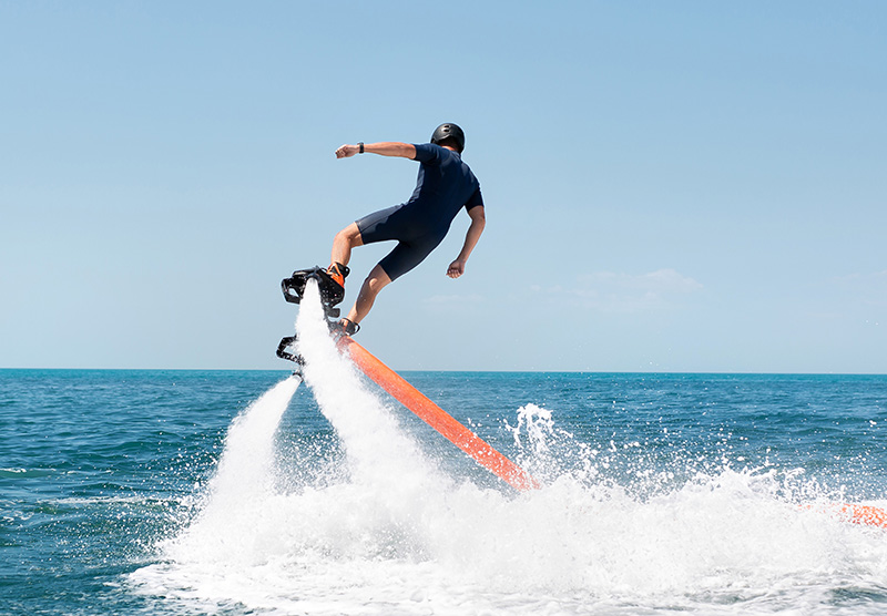 Person using a flyboard on water